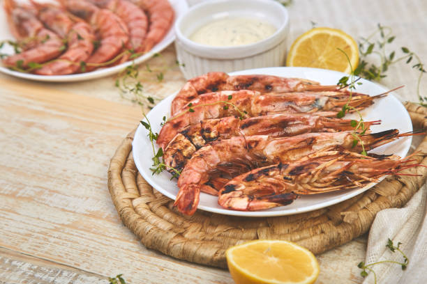 istock Grilled big tiger shrimps prawns on white plate 1141206098