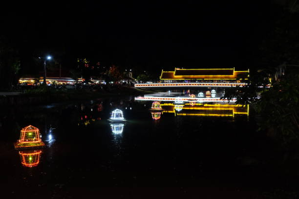 istock bridge over the river lit by night lights, illumination 1141206262