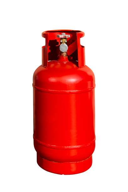 frasco de gás vermelho, cilindro do lpg isolado no fundo branco - natural gas cylinder flammable fire - fotografias e filmes do acervo