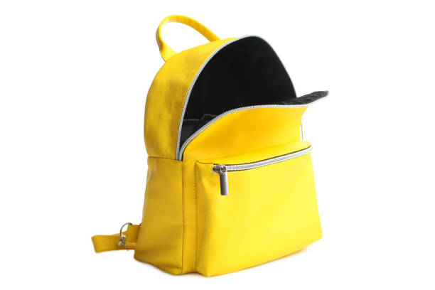yellow open backpack One stylish bright fashionable yellow open backpack isolated on white. Concept school, accessory. rucksack stock pictures, royalty-free photos & images
