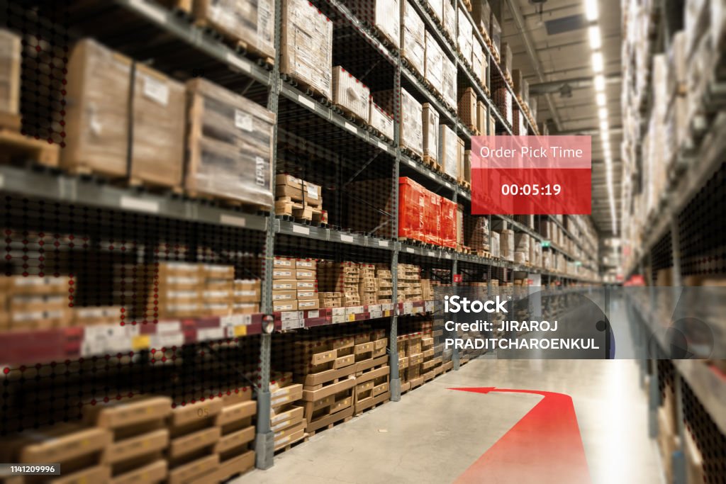 Smart warehouse use augmented reality mixed virtual reality technology ,AR glasses navigation application to pickup the order real time insights into shelf status from artificial intelligence(ai). Wearable Computer Stock Photo