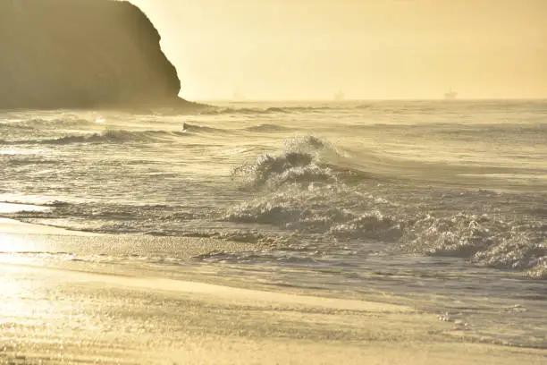 Beautiful waves washing onto the shore of california