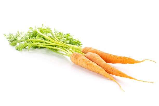 istock Fresh orange carrot isolated on white 1141211735
