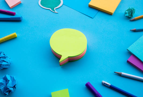 istock Business creativity note paper bubble on blue table background.brainstorming ideas 1141211884