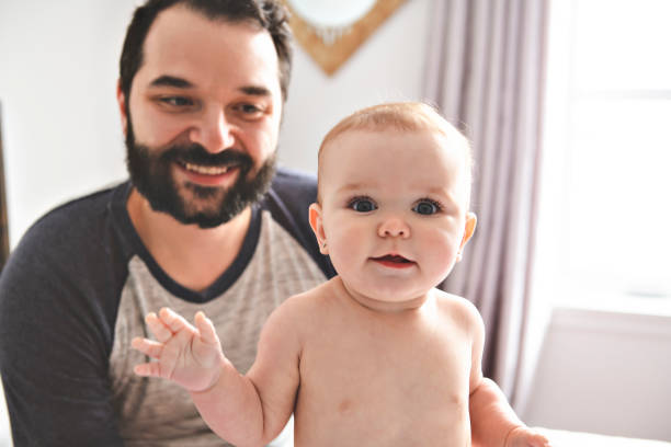 istock A Nice father with baby on bed 1141213597