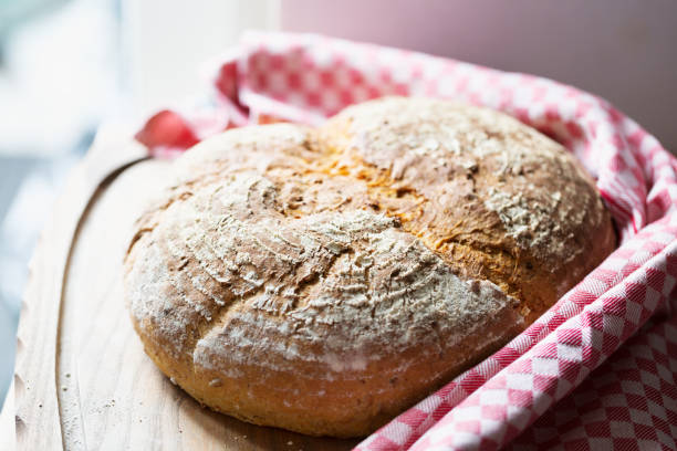 istock Homemade fresh bread on wood 1141213654