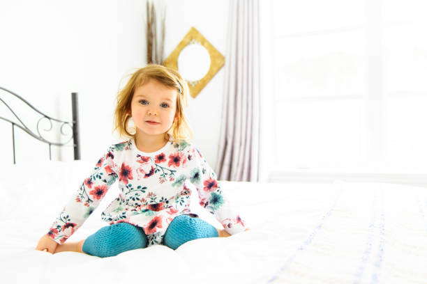 istock A child girl having fun on bedroom 1141213933
