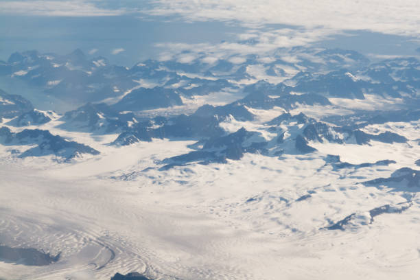 istock View of snowy mountains from a plane 1141215825