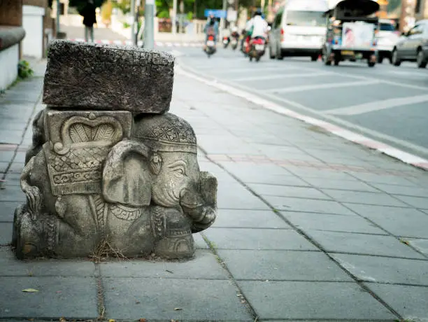 Photo of Long Chair Warrior Elephant Statue Style beside The Road
