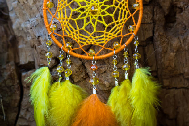 istock Handmade dream catcher with feathers threads and beads rope hanging 1141219295