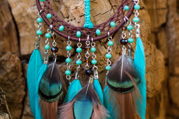 istock Handmade dream catcher with feathers threads and beads rope hanging 1141219298