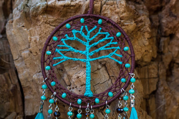 istock Handmade dream catcher with feathers threads and beads rope hanging 1141219304