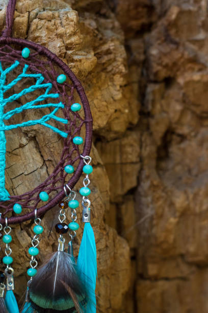 istock Handmade dream catcher with feathers threads and beads rope hanging 1141219311