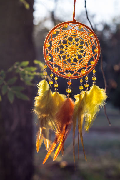 Dream catcher with feathers threads and beads rope hanging. Dreamcatcher handmade