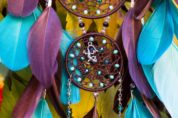 istock Handmade dream catcher with feathers threads and beads rope hanging 1141219344
