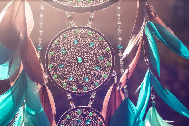 istock Handmade dream catcher with feathers threads and beads rope hanging 1141219365
