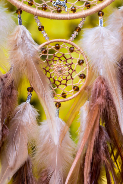 istock Handmade dream catcher with feathers threads and beads rope hanging 1141219722