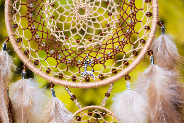 istock Handmade dream catcher with feathers threads and beads rope hanging 1141219725