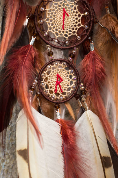 istock Handmade dream catcher with feathers threads and beads rope hanging 1141219832