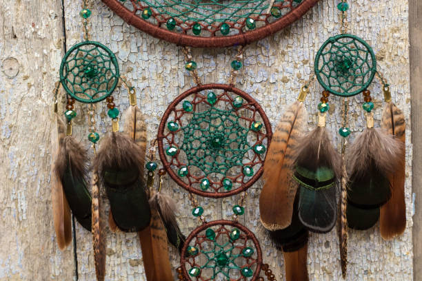 istock Handmade dream catcher with feathers threads and beads rope hanging 1141219847