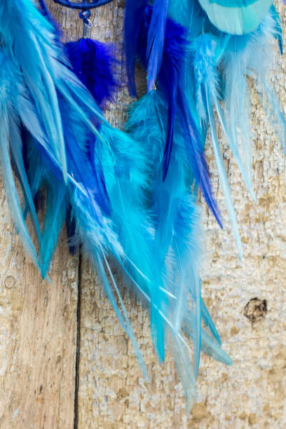 istock Handmade dream catcher with feathers threads and beads rope hanging 1141219855