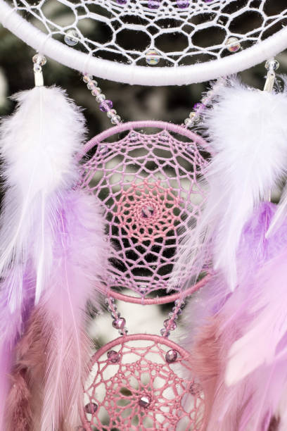 istock Handmade dream catcher with feathers threads and beads rope hanging 1141219887