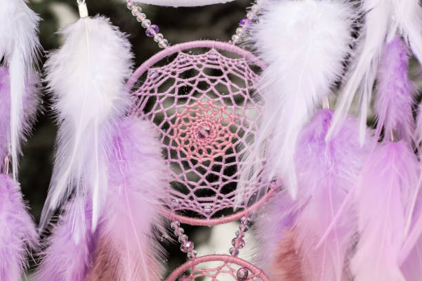 istock Handmade dream catcher with feathers threads and beads rope hanging 1141219889