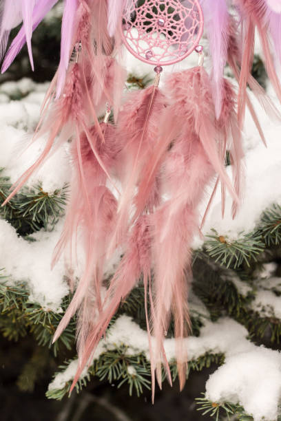 istock Handmade dream catcher with feathers threads and beads rope hanging 1141219908