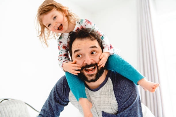 istock A Nice father with girl child on bed 1141220090