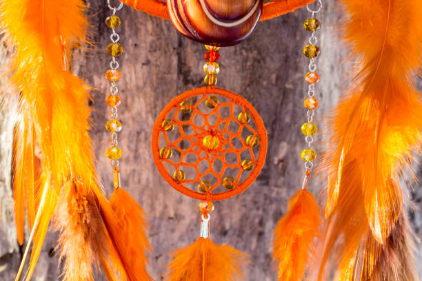 istock Handmade dream catcher with feathers threads and beads rope hanging 1141220196