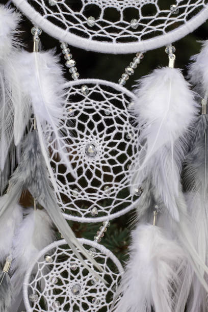 istock Handmade dream catcher with feathers threads and beads rope hanging 1141220343