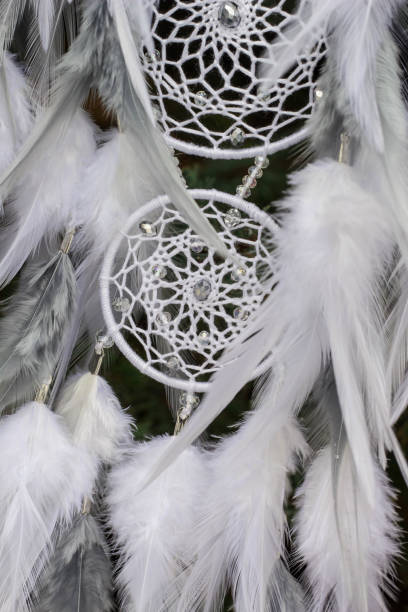 istock Handmade dream catcher with feathers threads and beads rope hanging 1141220347