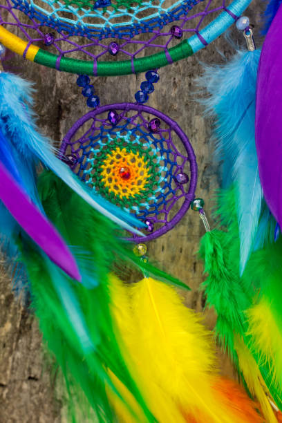 istock Handmade dream catcher with feathers threads and beads rope hanging 1141220431