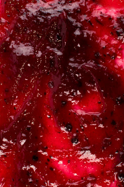 istock Dark Red Berry Jam Spreaded on Flat Background or 1141221970