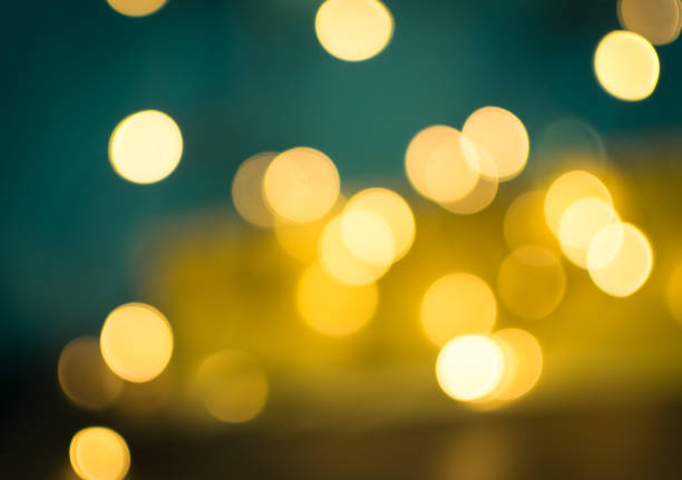 istock Abstract Yellow Bokeh Circles on Blurred Background 1141222022