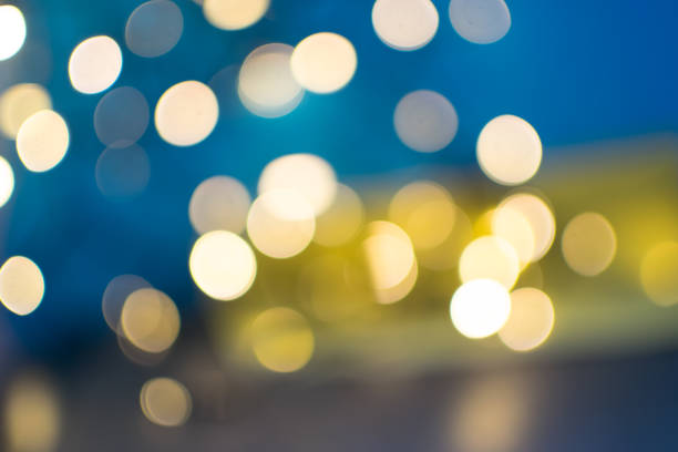 istock Abstract Yellow Bokeh Circles on Blurred Background 1141222037
