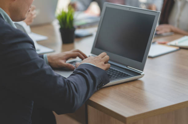 istock Businessman using laptop computer while meeting with team business,Conference Planning Business Concept 1141222858