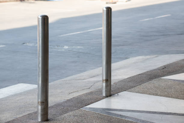 istock steel bollards on footpath. 1141224121