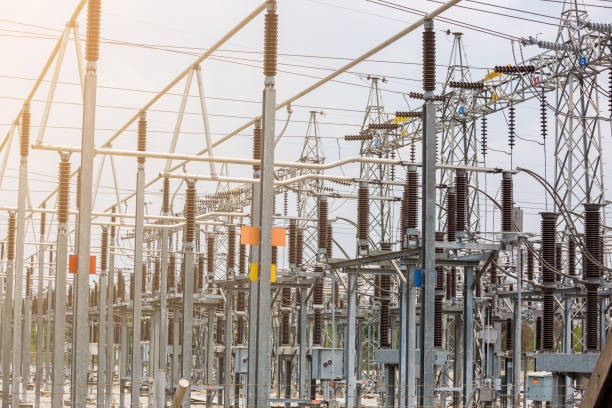 istock Electric power transmission lines, High voltage power transformer substation 1141224302