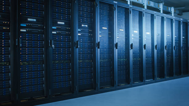 istock Shot of Modern Data Center With Multiple Rows of Fully Operational Server Racks. Modern High-Tech Telecommunications Database Super Computer in a Room. 1141224893