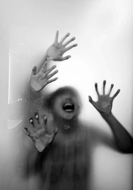 istock Two people behind frosted glass 1141225083