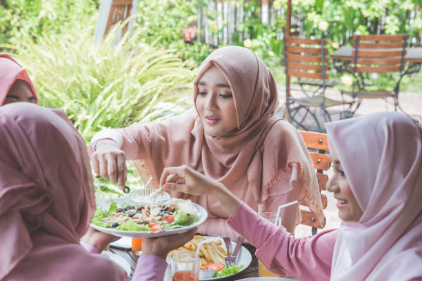 istock Asian girl friends having lunch 1141225439