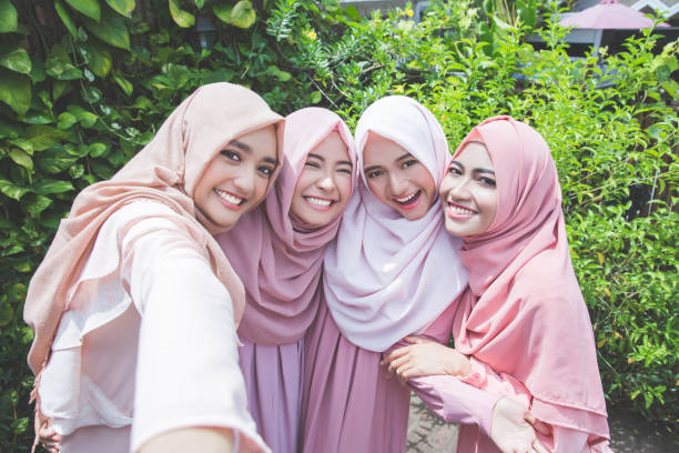 istock Young muslim girls taking selfie 1141226344
