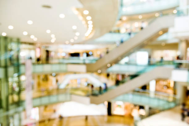 istock Defocused blurred background of modern shopping mall 1141226529