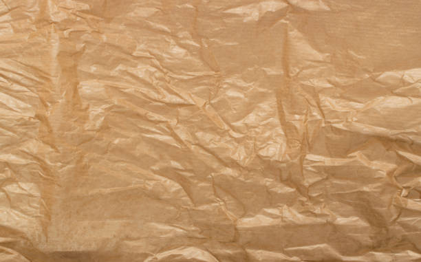 istock Crumpled Craft Paper Top View with Copy Space for Collages 1141226682