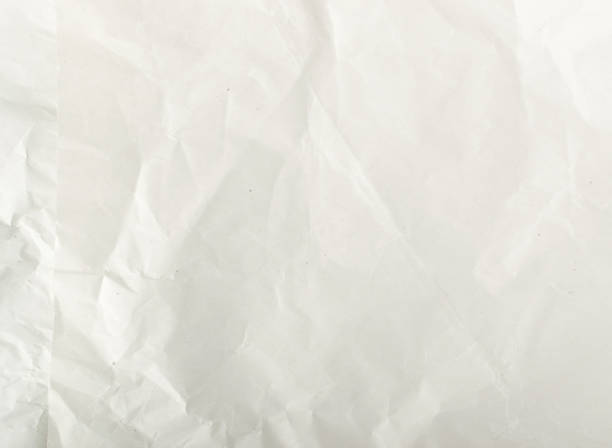 istock Sheet of White Thin Crumpled Craft Paper Background 1141226707