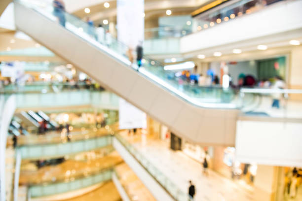 istock Defocused blurred background of modern shopping mall 1141226828