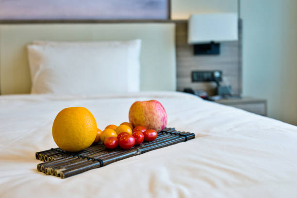 istock Fruits on bed in hotel room 1141227037