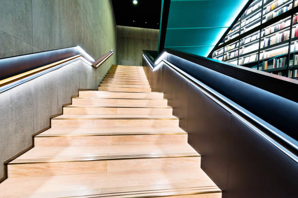 istock Wooden stairs in the library 1141231019