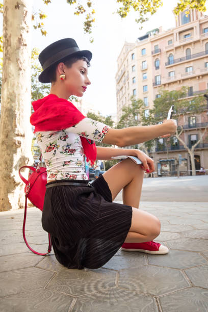 istock Girl taking self-portrait on smart phone 1141232067